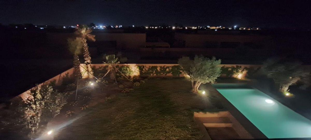 vue nuit jardin piscine marrakech